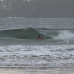 Colin Angus paddling the Atlantis WaV through dumping surf.